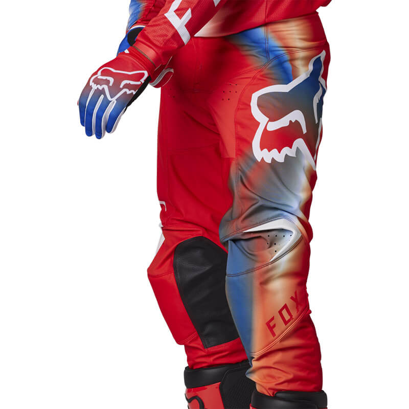 tenue fox 180 toxsyk 2023 pantalon rouge fluo motocross